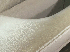 Wear on the color surface of the leather interior can be repaired using the HBC Systems color mixing system.